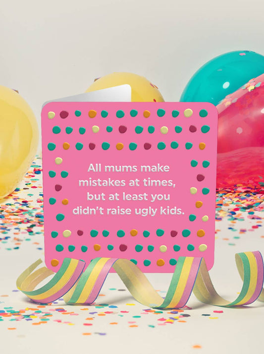 Pink polka dot card with humorous message on a colorful confetti and balloon background