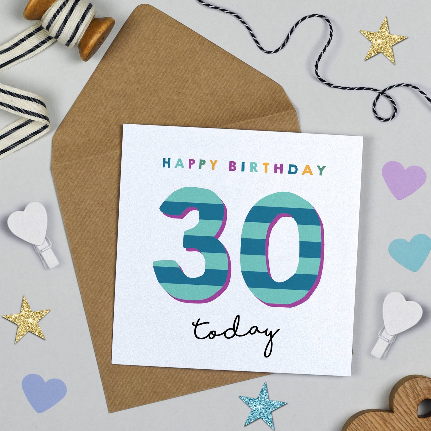 Birthday card with 'Happy Birthday 30 today' text on a white background with decorative items.