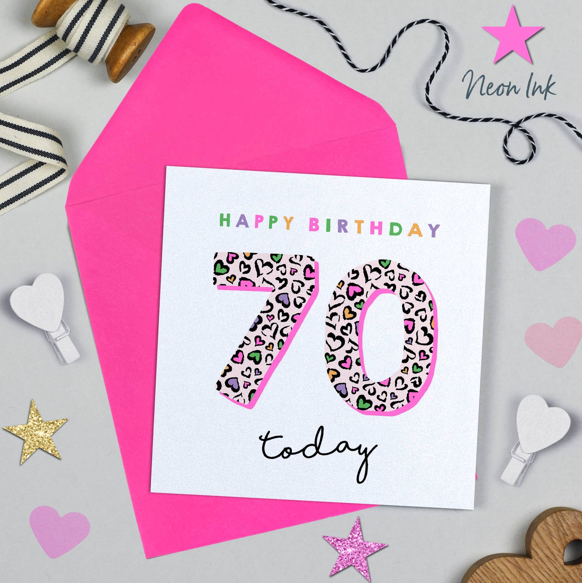 Birthday card with leopard print number 70 and 'Happy Birthday today' text on a pink envelope.