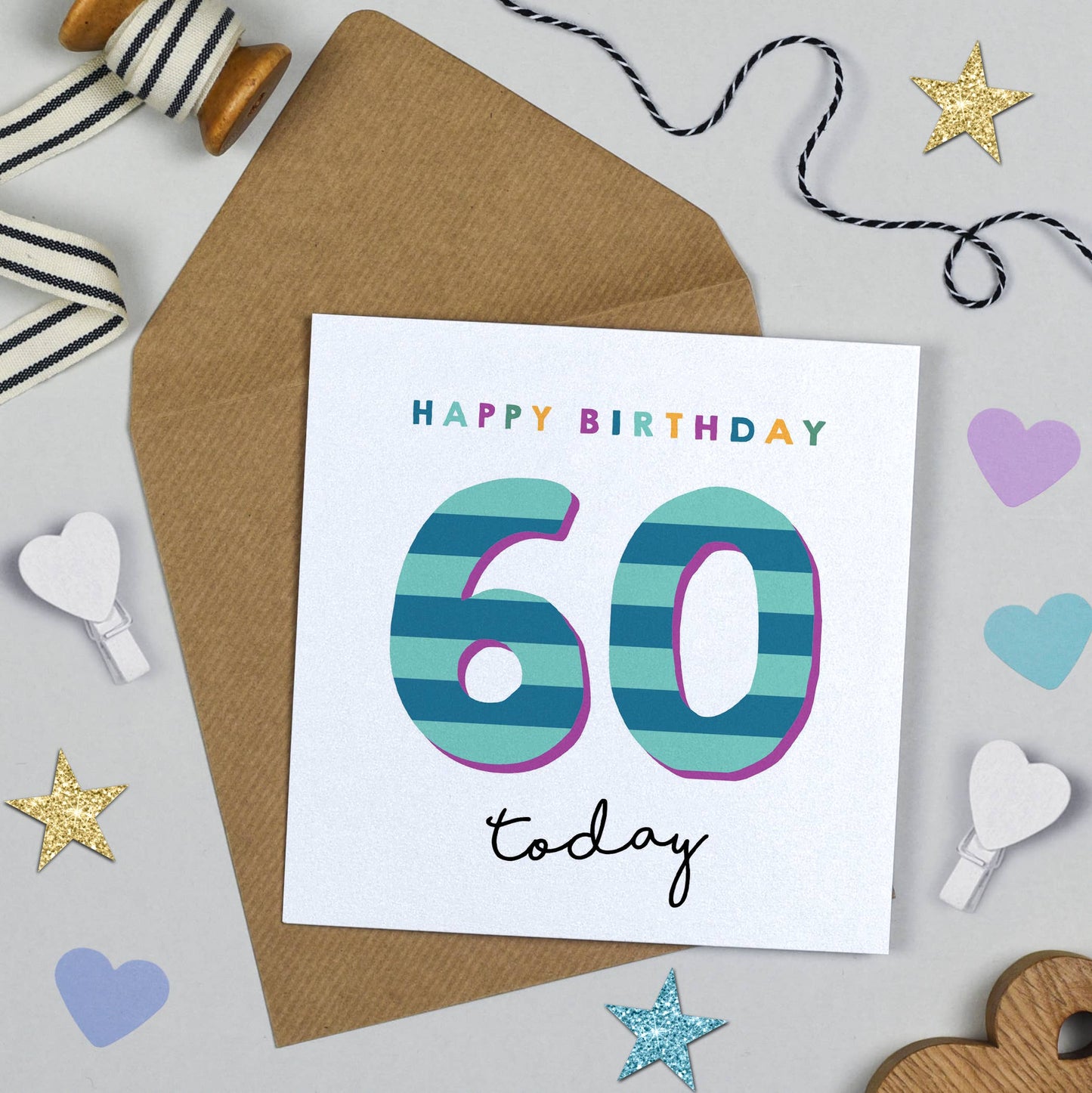 60th birthday card with decorative elements on a light gray background
