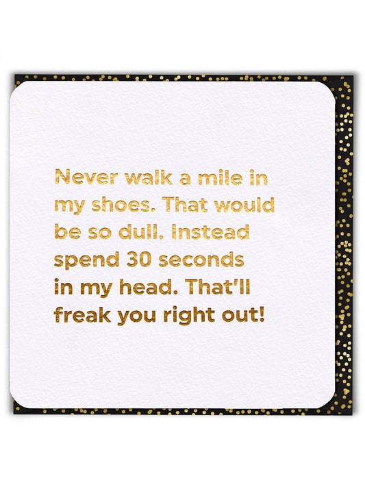 White card with gold text and black border