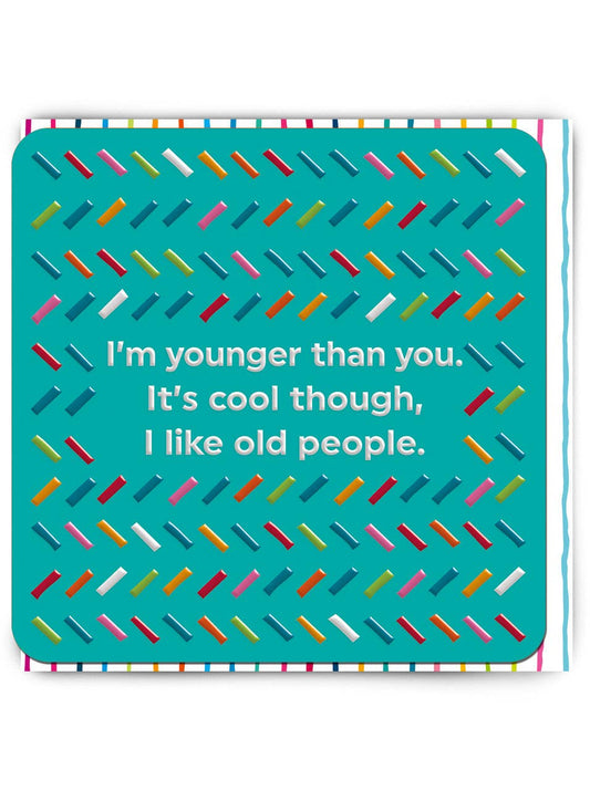 Card with colorful pattern and humorous text on a teal background