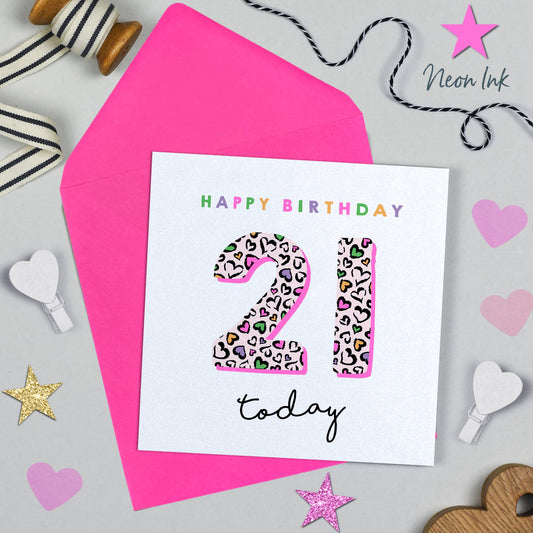 Happy Birthday 21 today card with leopard print numbers on a pink envelope.