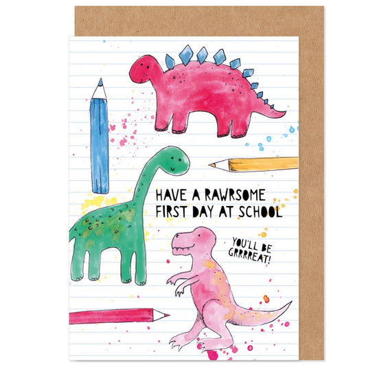 A colorful greeting card with illustrations of dinosaurs and pencils, with a message that reads 'HAVE A RAWRSOME FIRST DAY AT SCHOOL'. There is also a brown kraft envelope shown.