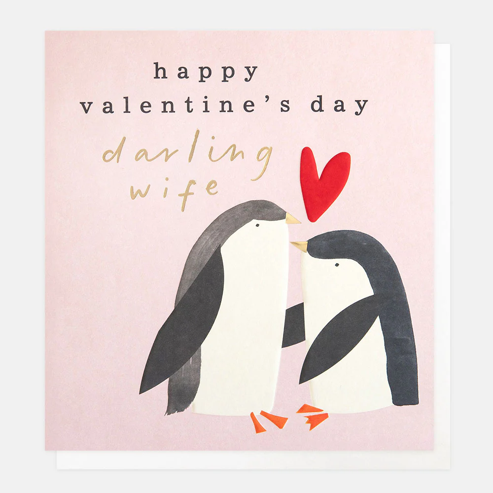 Valentine's Day card with penguins and a red heart on a pink background