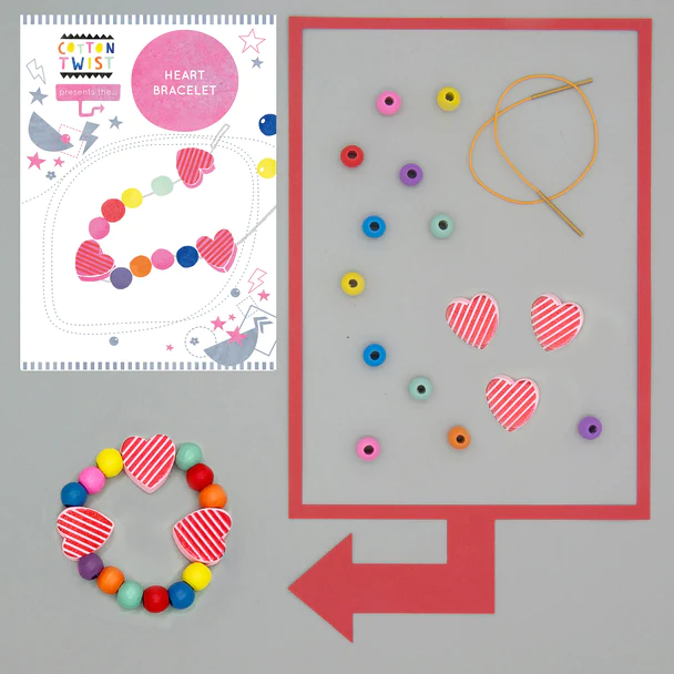 A grey background with a completed heart bead bracelet, a picture of all the beads and the packaging photo.