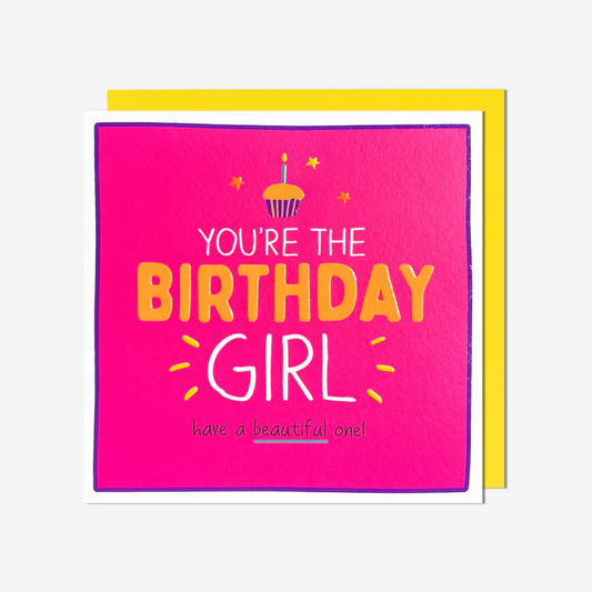 Birthday card with 'You're the Birthday Girl' text on a pink background