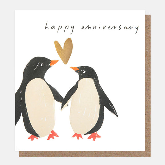 Card with two penguins holding a heart and 'happy anniversary' text on a white background.