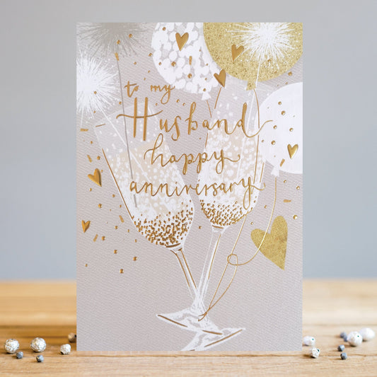 Husband Anniversary Champagne and Hearts Greeting Card