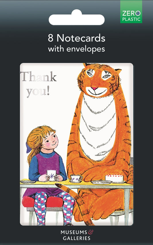 A black pack of notecards with white card and a large tiger with a little girl having tea. Thank you,