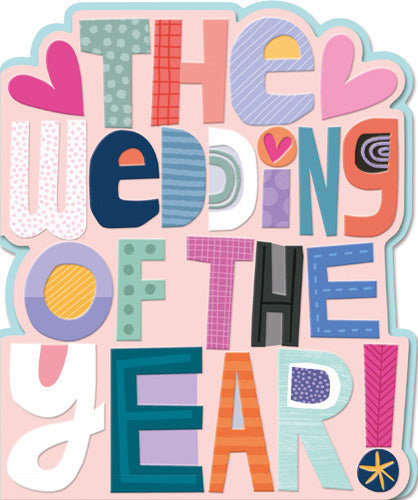 The Wedding Of The Year Greeting Card by Pigment Productions features playful, colorful text on luxury textured card, two pink hearts, and a pastel background—perfect for celebrating newlyweds.