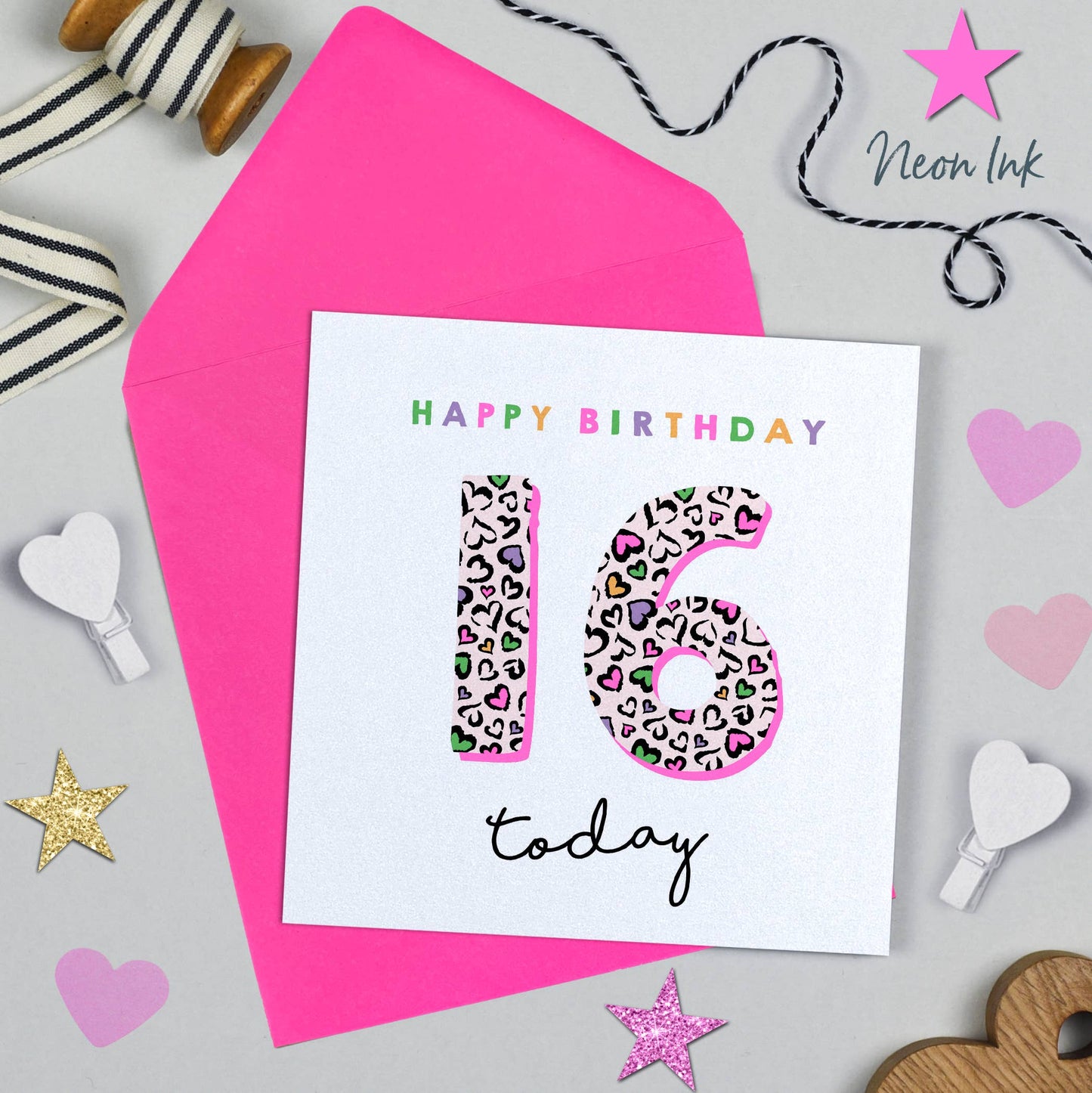 Birthday card with leopard print number 16 and 'Happy Birthday today' text on a pink envelope.