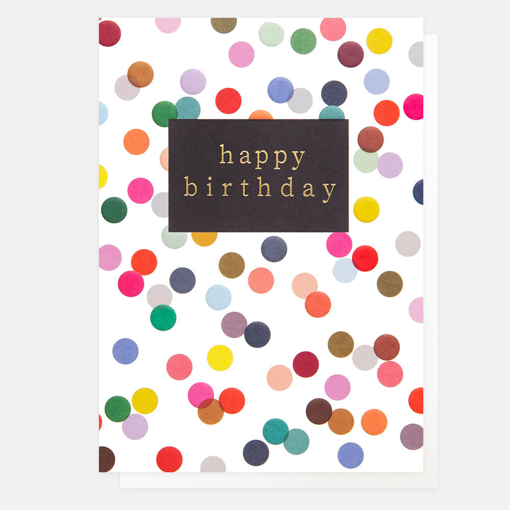 A white card with mult-coloured spots on it.  In the centre is a black box with the words "Happy Birthday" written in fine gold.