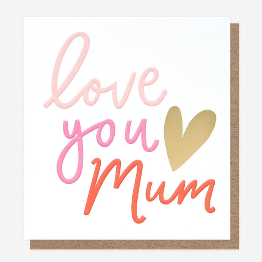 A white card with the words Love you Mum and a Gold heart. Love you Mum is in three shades of pink. A kraft envelope is shown.