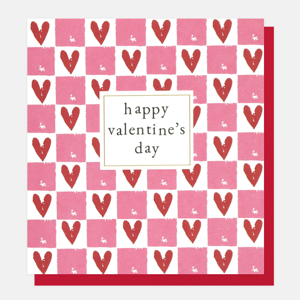 A red, white and pink card with hearts inside checked boxes and Happy Valentines Day in a white box in the centre of the card.