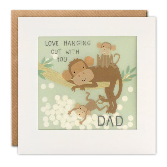 A white framed card with two monkeys and the words ‘Love hanging out with you Dad’