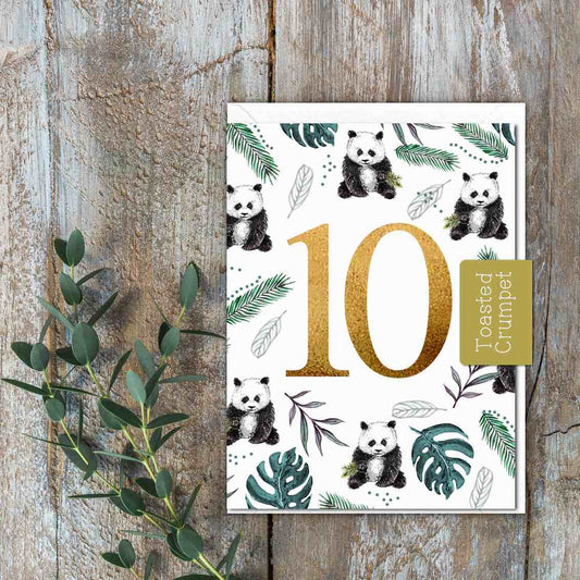 A white card with 10 in the middle and pandas and bamboo leaves